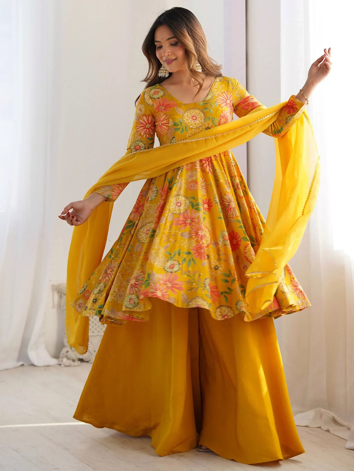 Attractive Yellow Floral Printed Silk Festival Wear Palazzo Suit With Dupatta